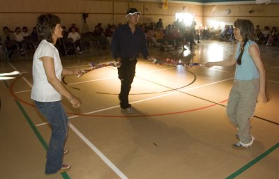 Stan Sr. doing the handkerchief dance with Glenna and Maureen.