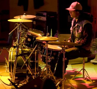 Allen banging on the drums.