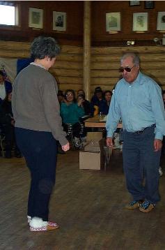 Mme Clarkson and John Joe Kyikavichik dance to the Red River Jig
