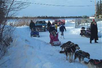 Mme Clarkson with musher Vicky Josie