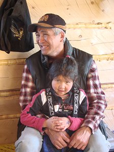 Chief Johnny Kay with his granddaughter.