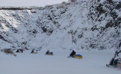 Going by a bluff on there way home.