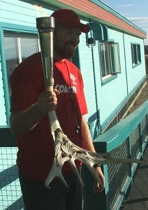 Dustin Davis takes the torch with great pleasure