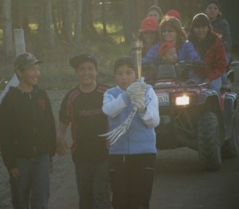 Melissa Lords walks with the torch