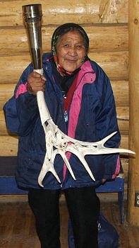 Elder Edith Josie holding up the torch with much joy
