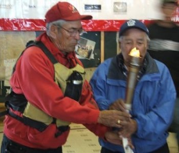 Stephen Frost passes the Torch to John Joe Kyikavichik
