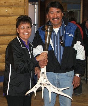 Our present MLA Lorraine and her husband Ernie Peter holding the torch together