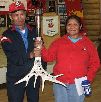 Andrew and Shirley holding the torch
