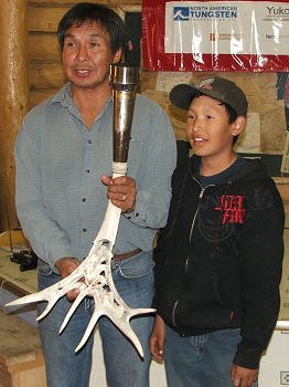 Joe Tetlichi and his son Jamie with the torch