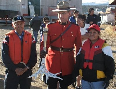 L-R Andrew Charlie, Corporal Paul Thalhofer, and Shirley Kakfwi