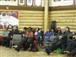 Community members  and visitors listening to the book launch presentations.