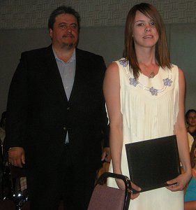 Grand Chief Andy Carvill with VGFN Grad Tahara Simard.