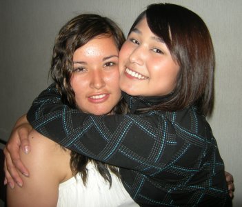 Kecia getting a big hug from her cousin.