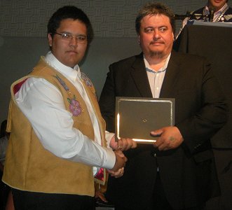 VGFN Grad Kenneth with the CYFN Grand Chief.